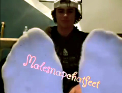Hot teen boy offers you his feet and socks