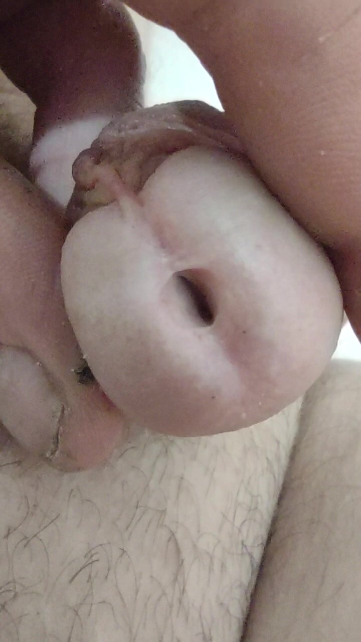 Close up open urethra slow piss