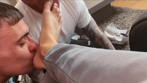 TWO SLAVES SUCK AND WORSHIP MASTERS FEET