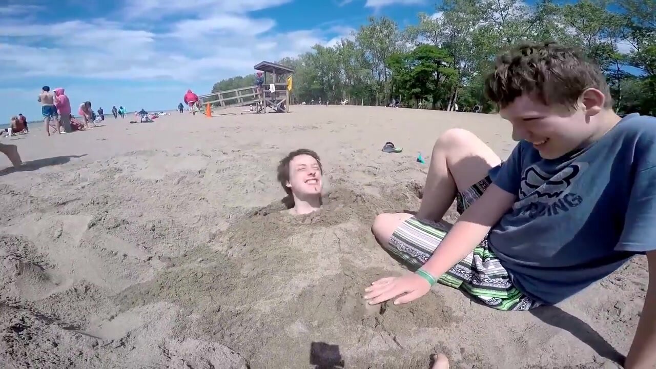 Finn buried in sand & knee tickled