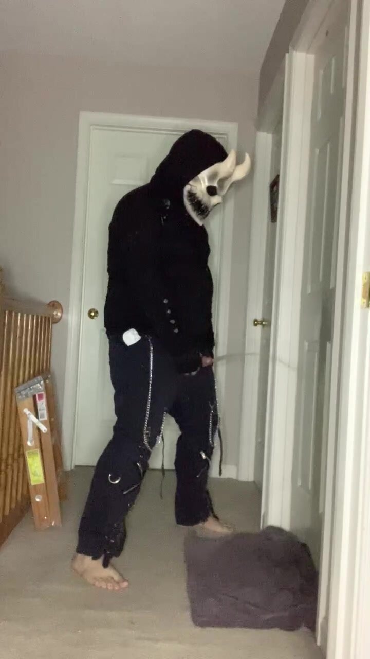 Demon pissing on door
