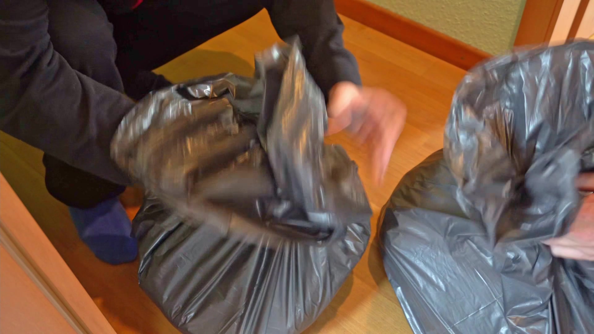 Moving diapers in second trashbag (TOO HEAVY trash)