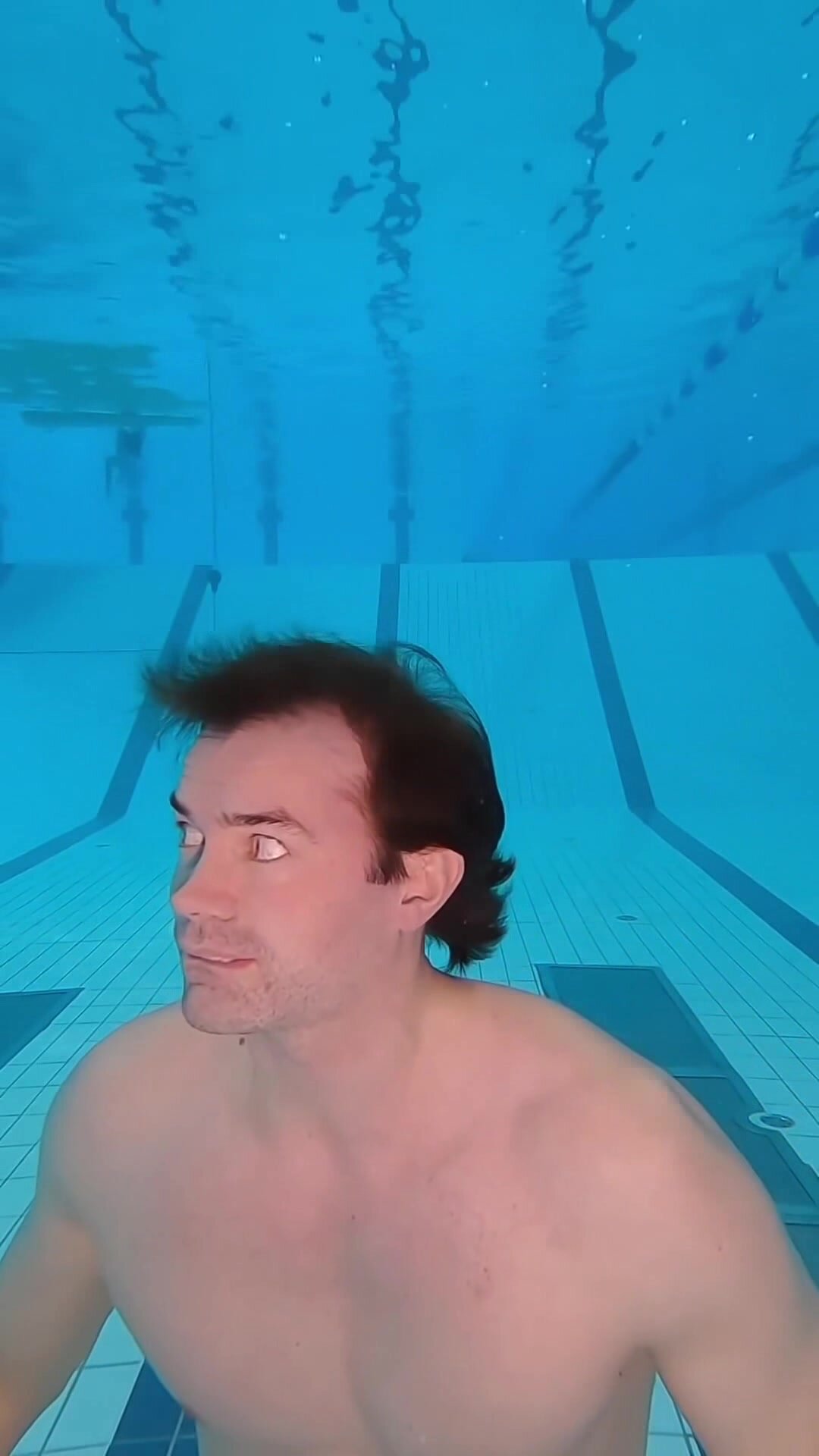 Breatholding barefaced underwater in pool - video 2