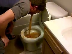Guy Pukes All Over the Toilet