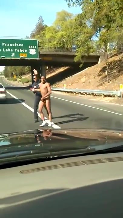 naked black guy on road