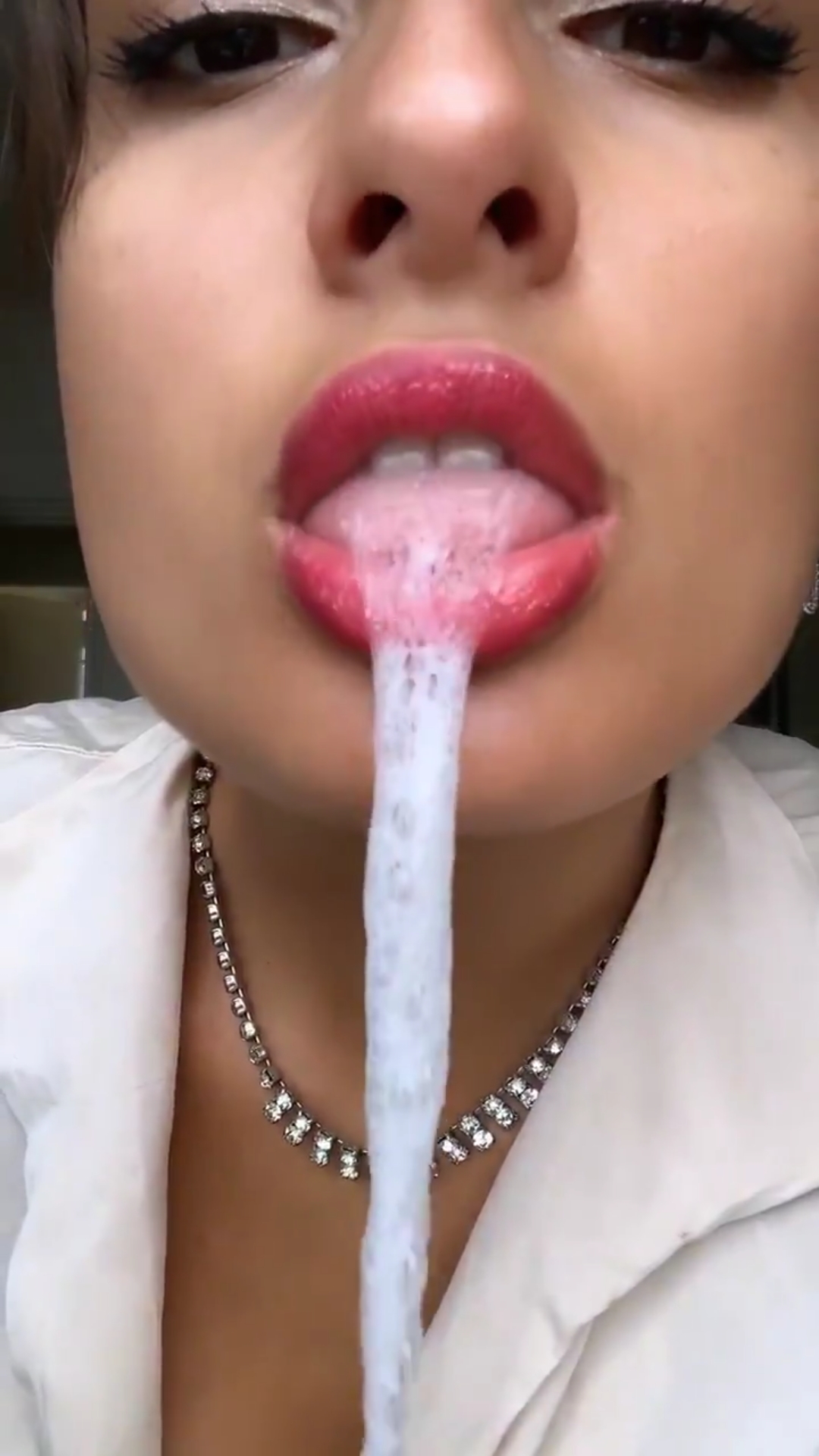 Sexy girl spitting loogies
