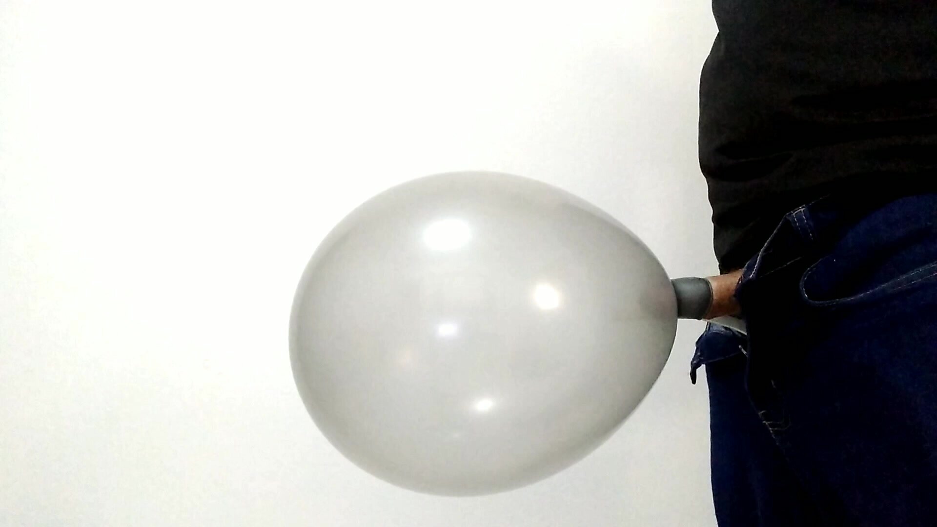 Blowing a balloon in my cock