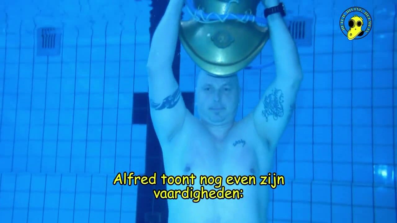 Dutch helmet bald diver barefaced underwater in pool