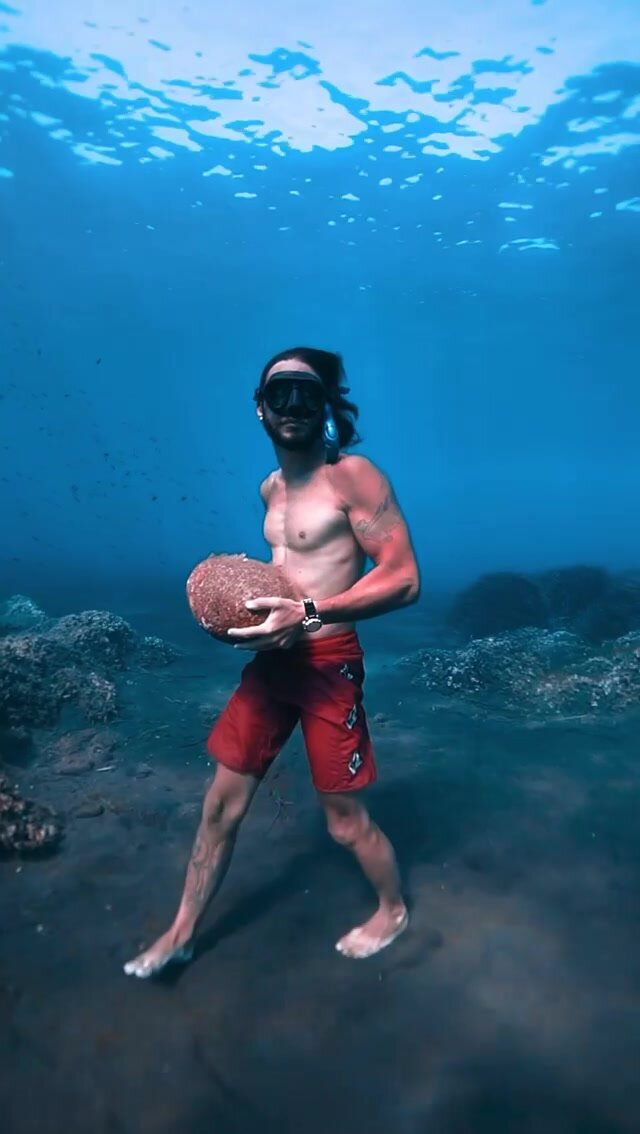 Walking underwater with rock