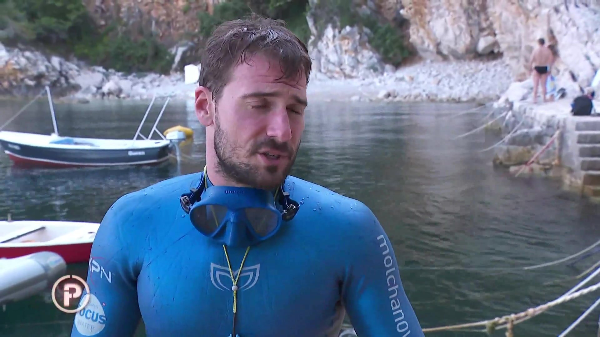 Freediver hottie barefaced underwater in wetsuit