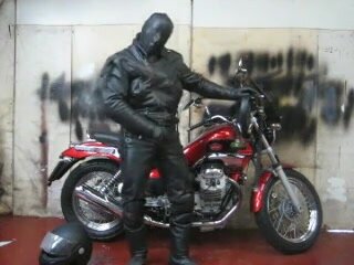 Fully masked leather guy motorbike wank