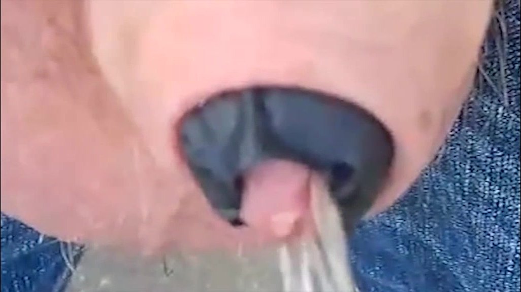 pissing with masked cock