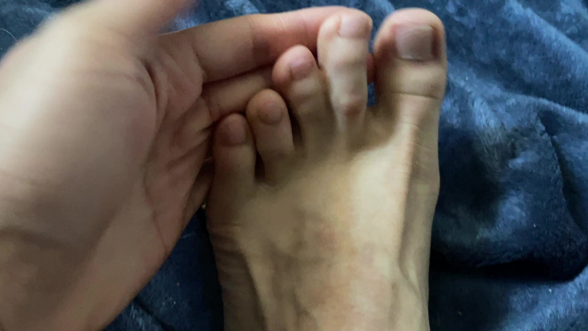 Cute guy showing his unique webbed toes