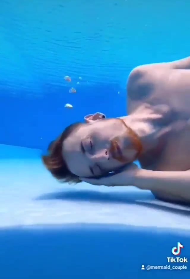 Underwater barefaced bearded merman
