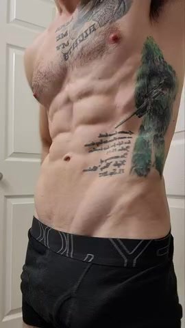 Ripped guy flexing - video 4