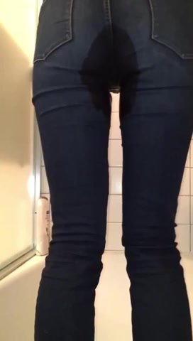 Teen girl wet in jeans masturbating  in shower