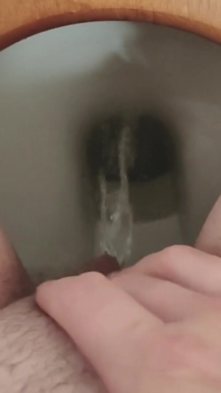 Touching hairy pissing pussy