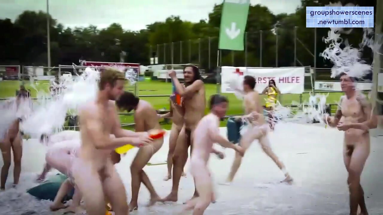 Fun ambiance in a nude water fight!