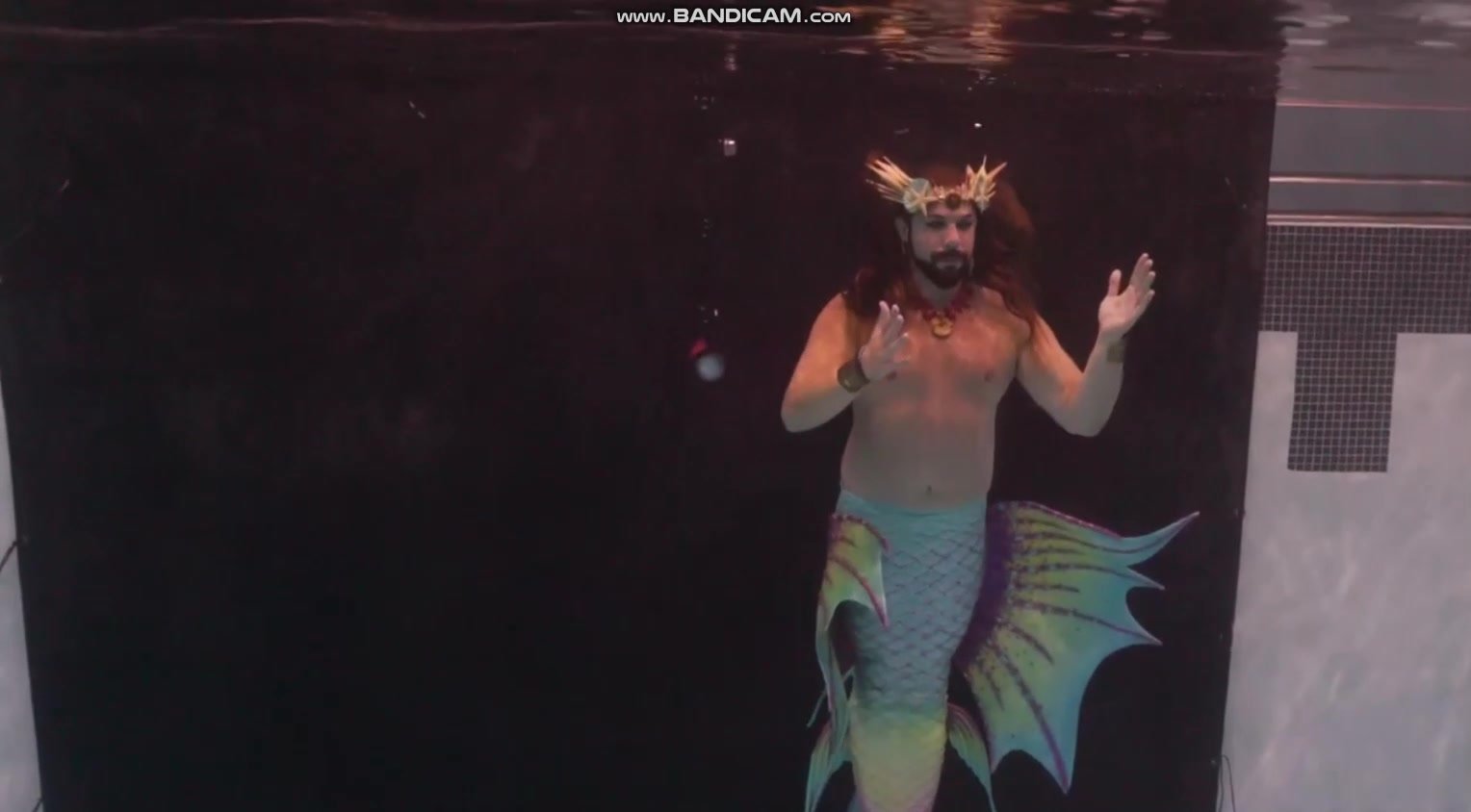 Underwater photoshoot of a barefaced merman