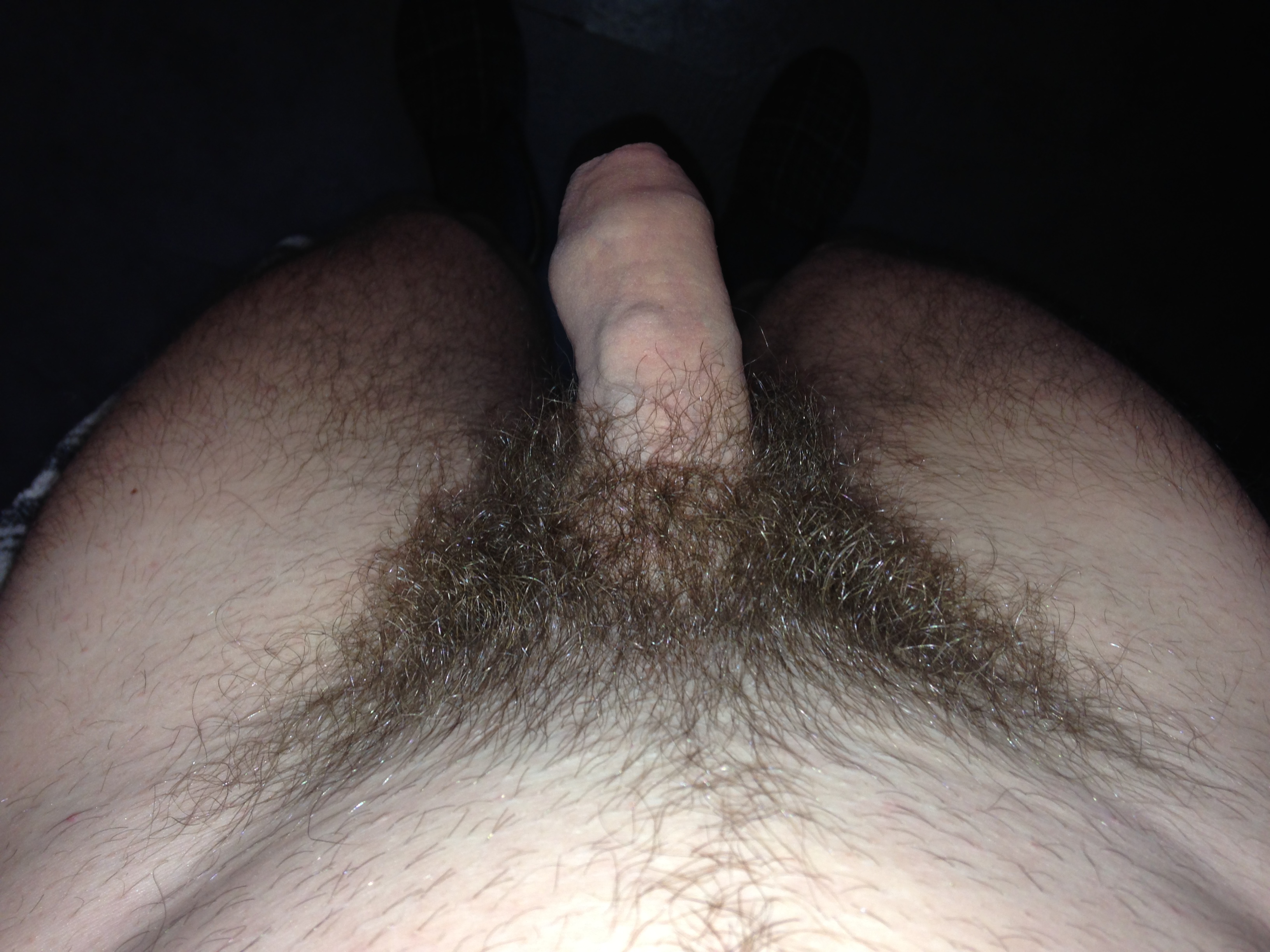 Shaving his bush off with a beardtrimmer