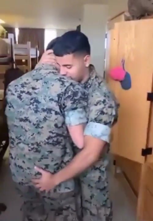 military men dancing and copping a feel