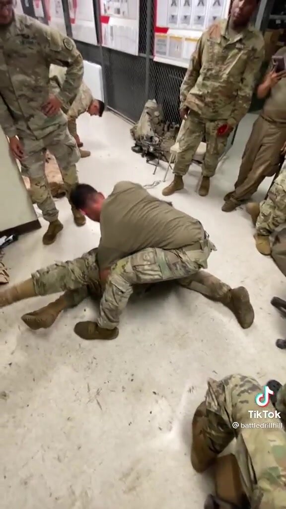 soldiers wrestling