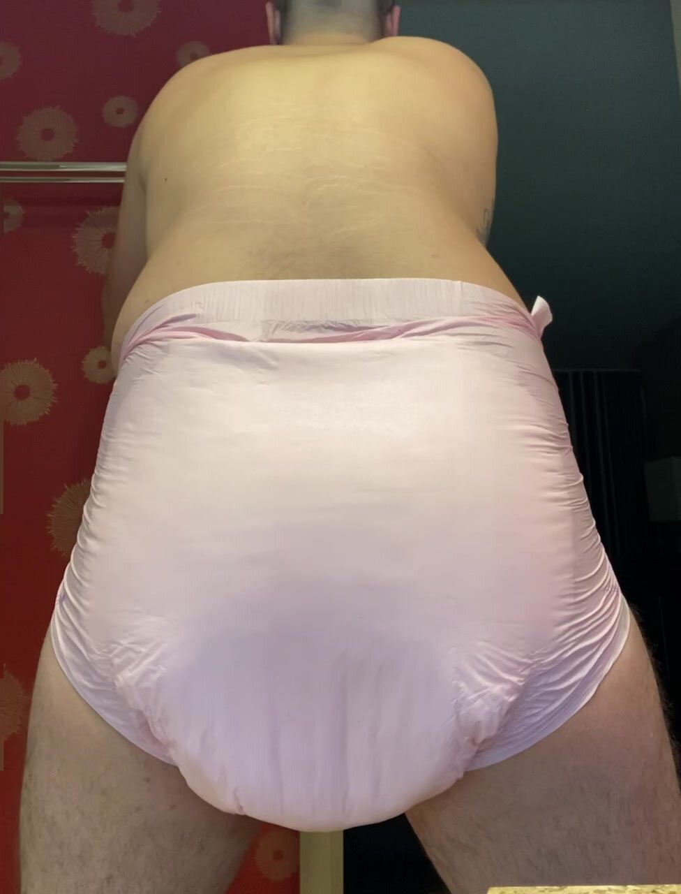 Huge poop in pink diaper