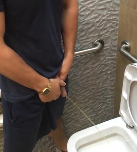 Just a guy pissing