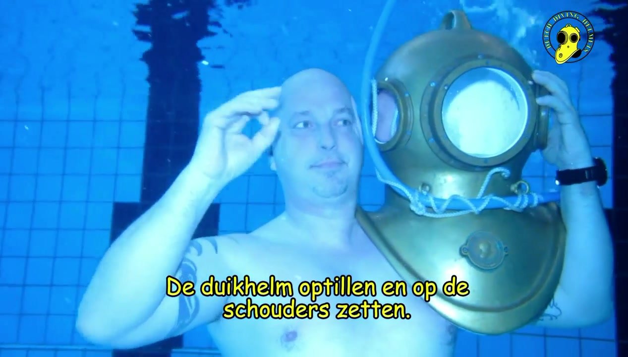Dutch beefy helmet diver barefaced underwater