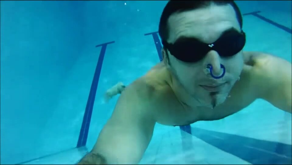 French freedivers breatholding underwater in pool
