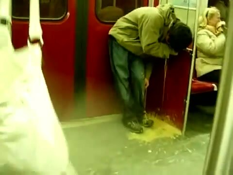 Guy Puking On The Metro