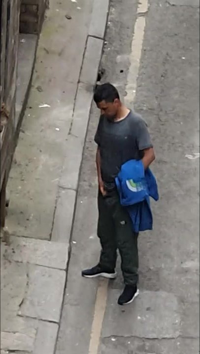 Man pissing on the street