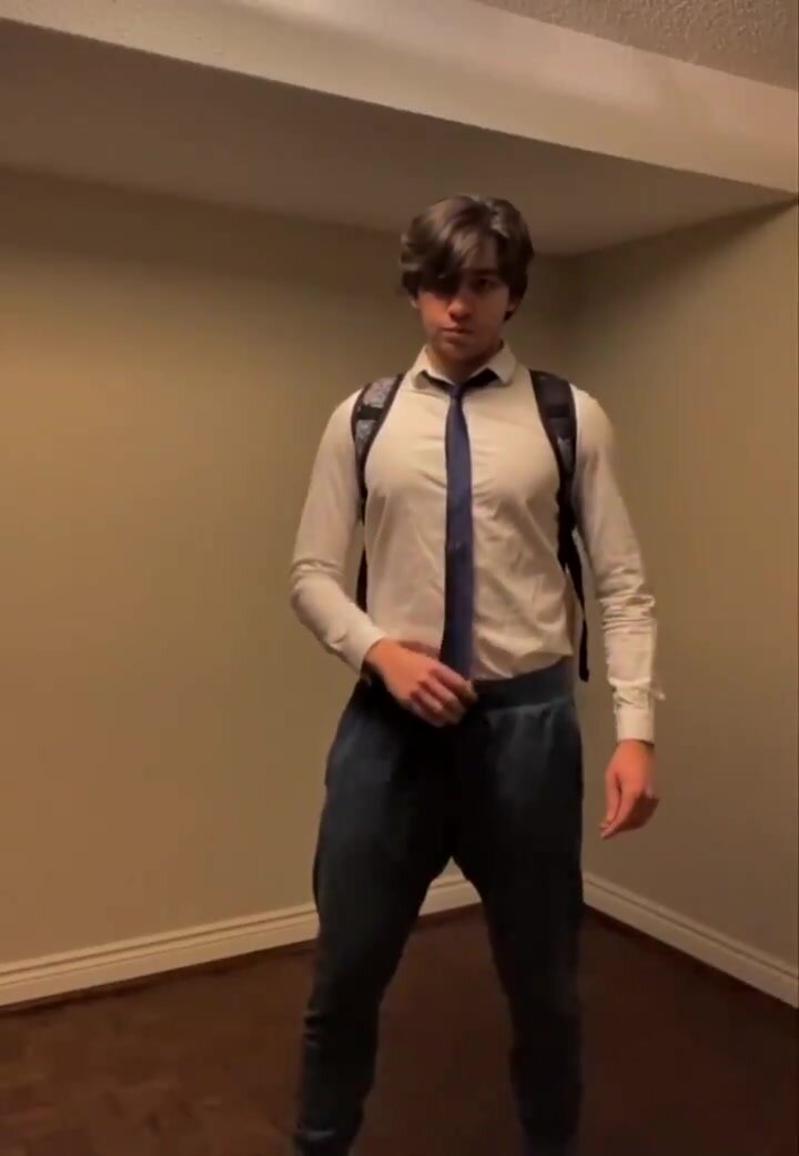 Alex tries to dance,  reveals fully erect dick instead