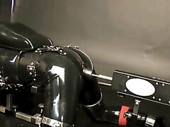 Rubngum old video rubber bdsm fucked by machine