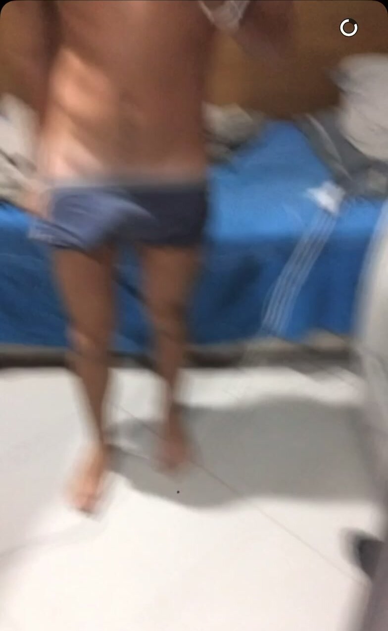Brazilian guy strips, shows cock