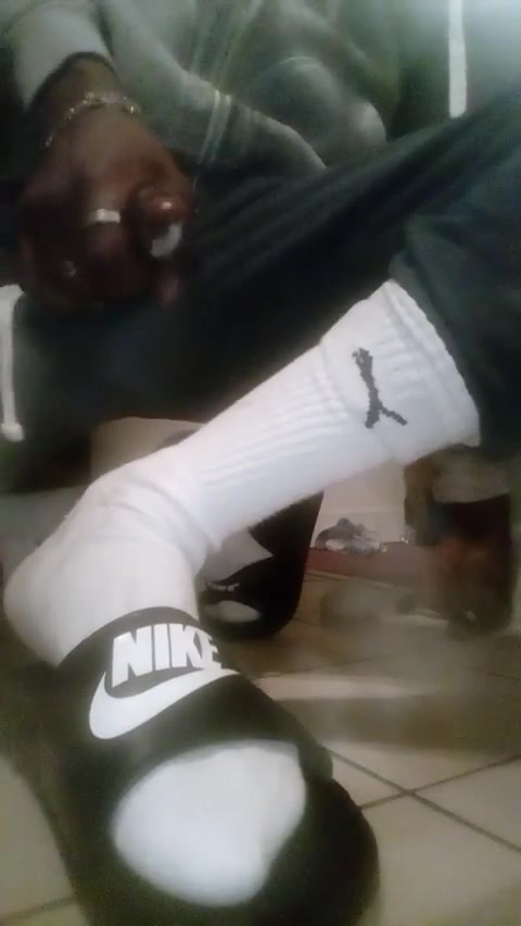 Black thug guy wank cock wearing slides and white socks