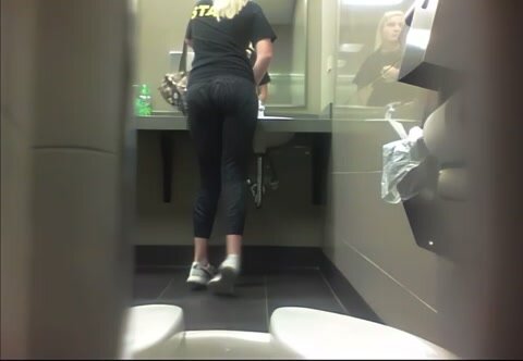Gym staff with nice ass on the toilet