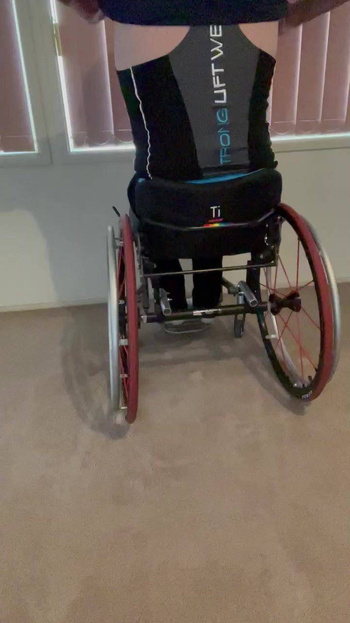 Muscle Singlet in wheelchair.