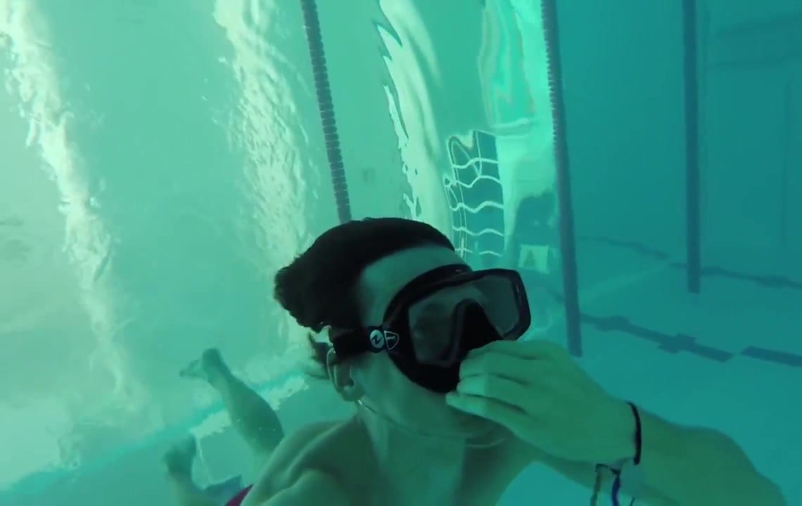 Russian breatholding underwater in speedos