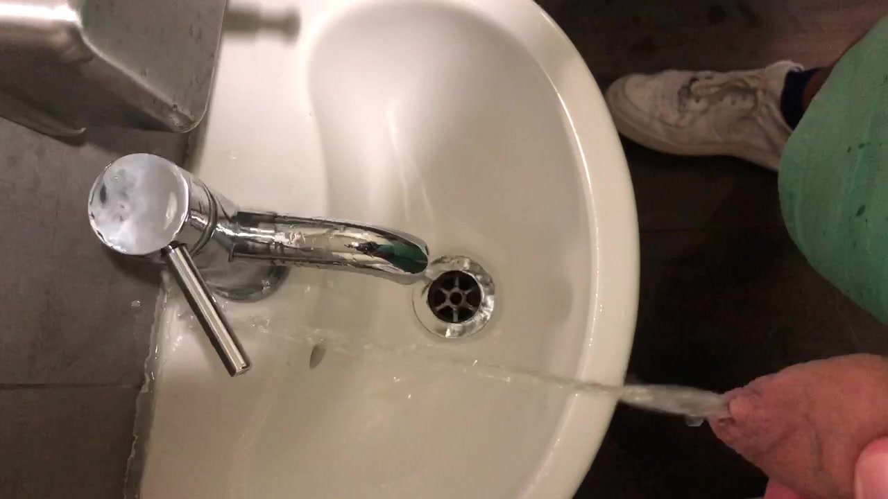 Pissing in public toilet - video 2