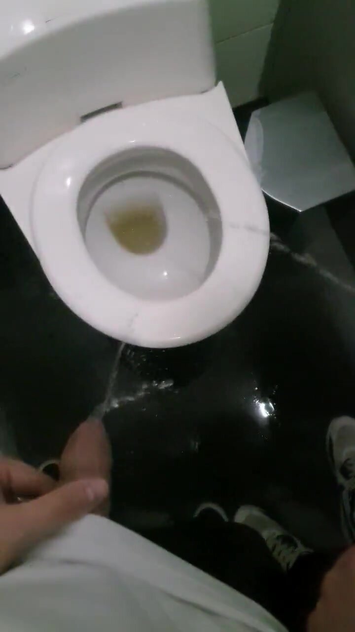 Friends have fun in a toilet