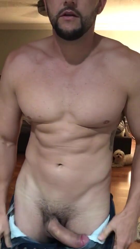 Huge muscle hunk stripping off