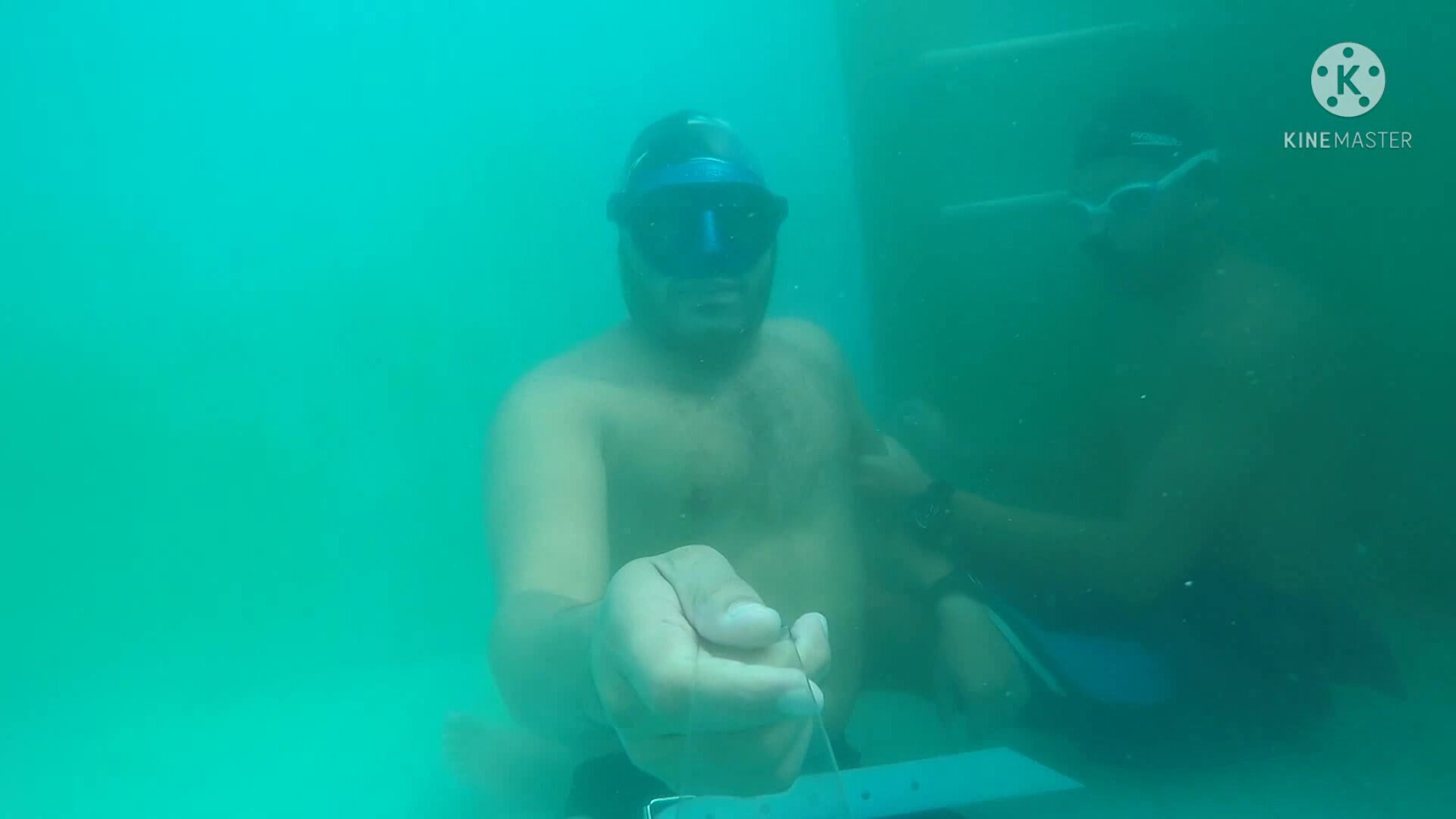 Kareem and friend breatholding again underwater