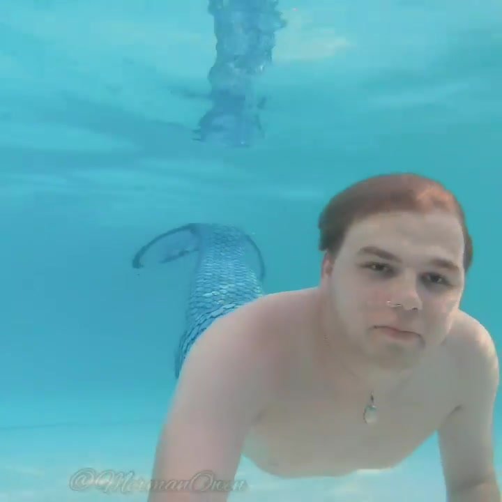 Merman swimming barefaced underwater - video 2