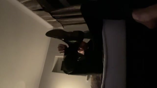 Straight UK English guy takes off formal shoes. Pov