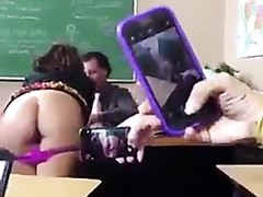 A schoolgirl show her ass