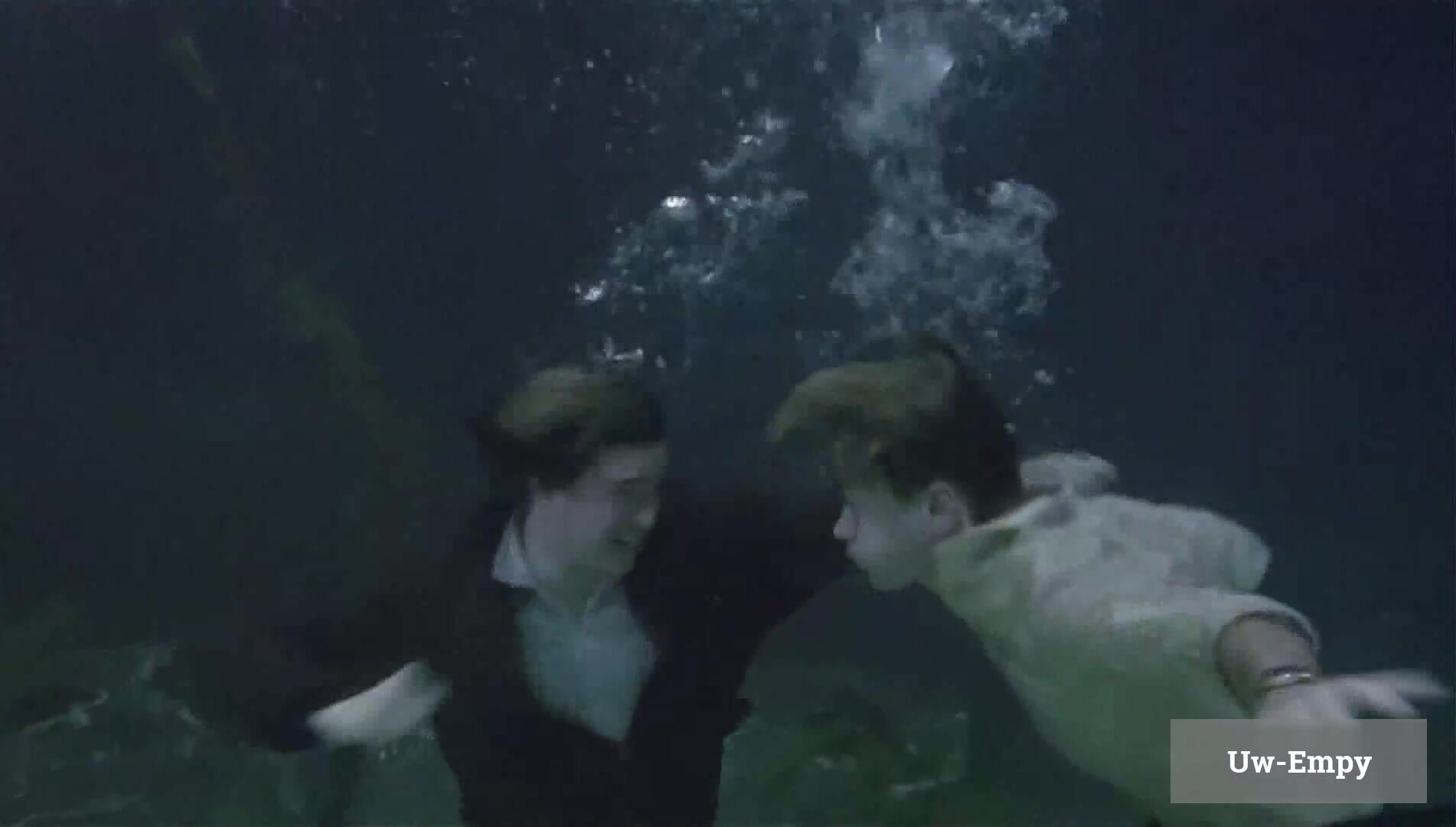 Underwater barefaced and clothed fight