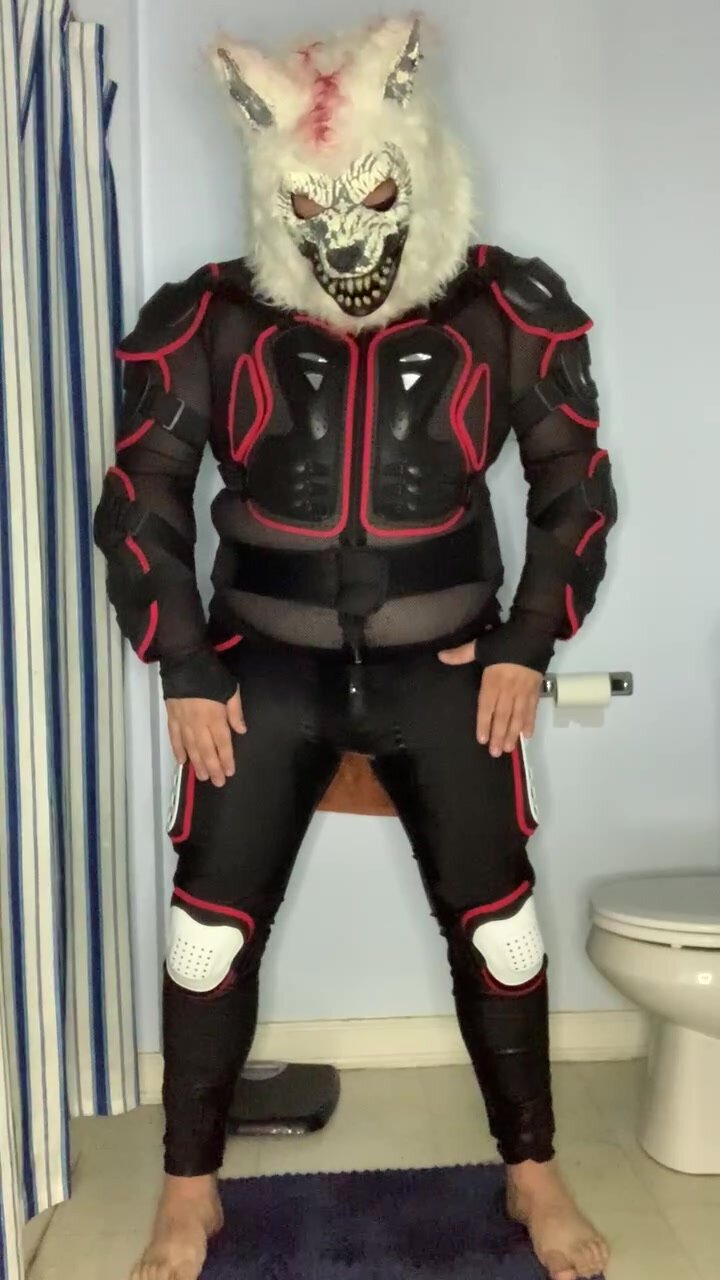 A piss and wank in motorcycle armor