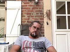 Hot daddy smoking and jerking in his backyard