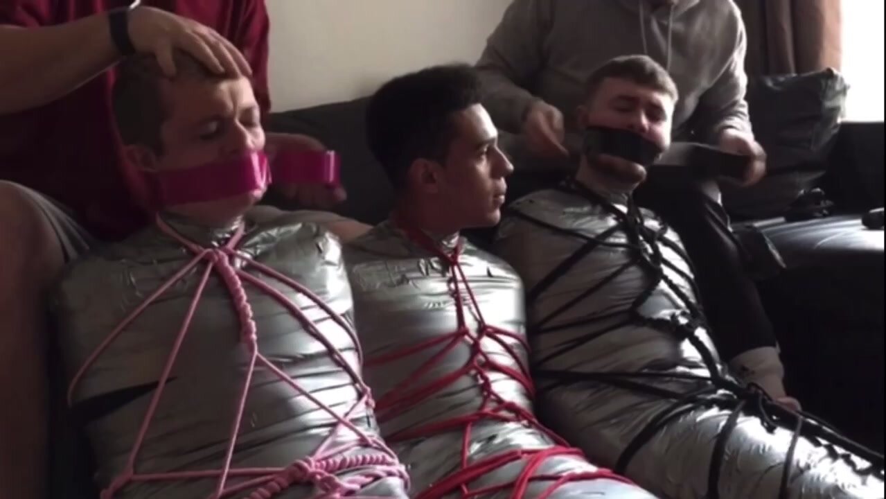 Three guys taped up and gagged